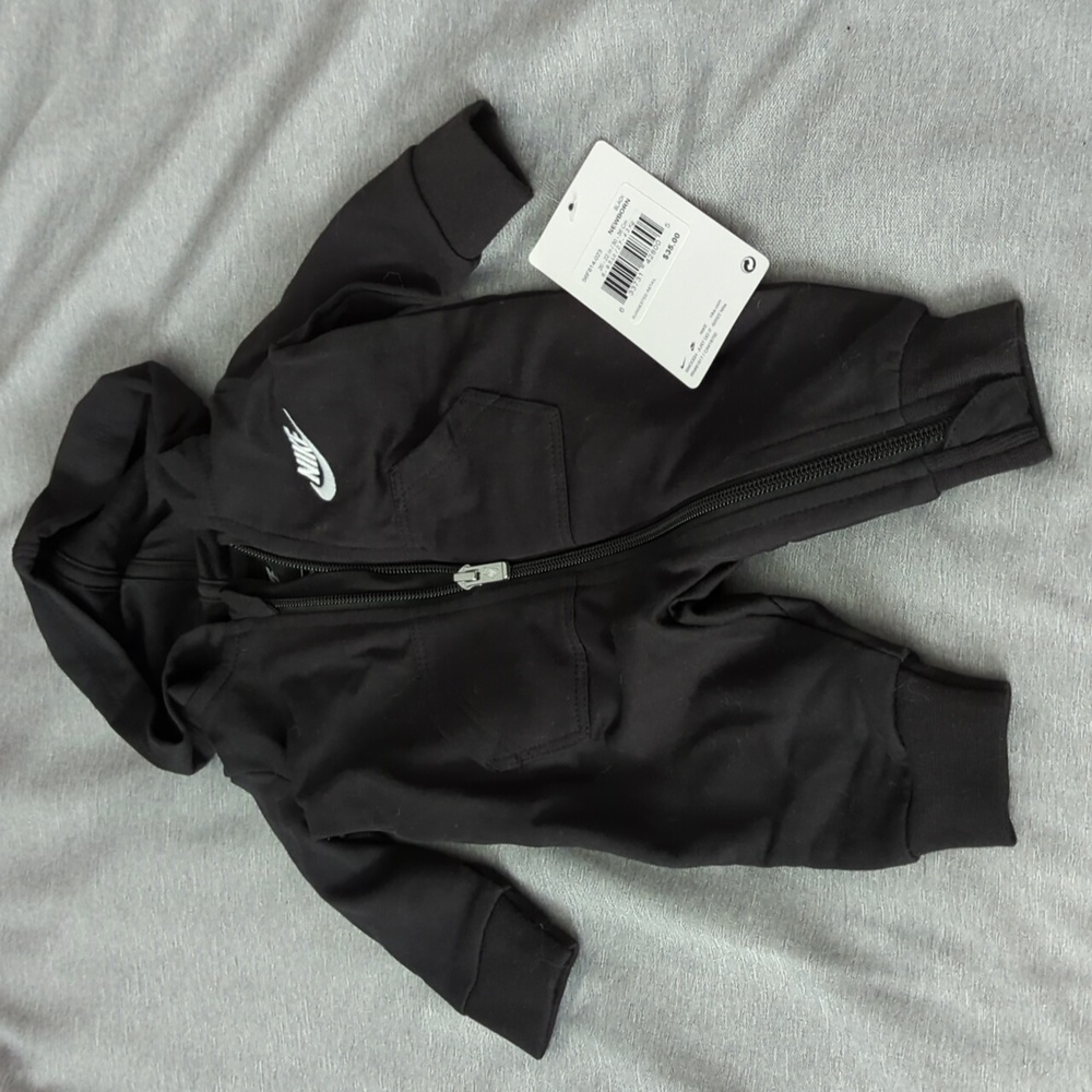 NWT Nike newborn one piece hooded zip up outfit.